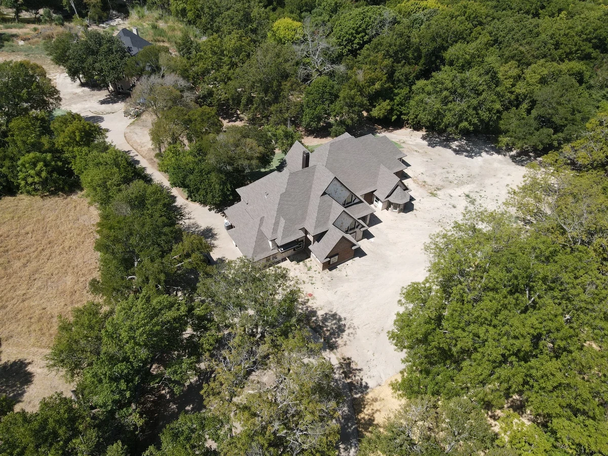 Main residence and surrounding trees, 2140 Bells Chapel Road - September 2026 / MLS