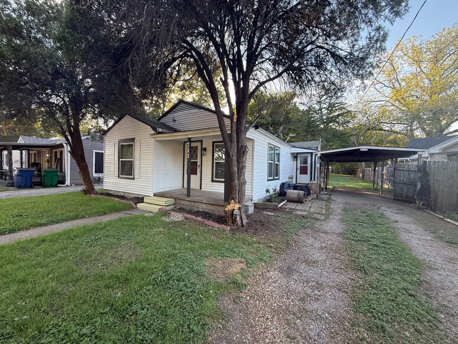 A tree-framed arrival, 711 Dunn Street - October 2026